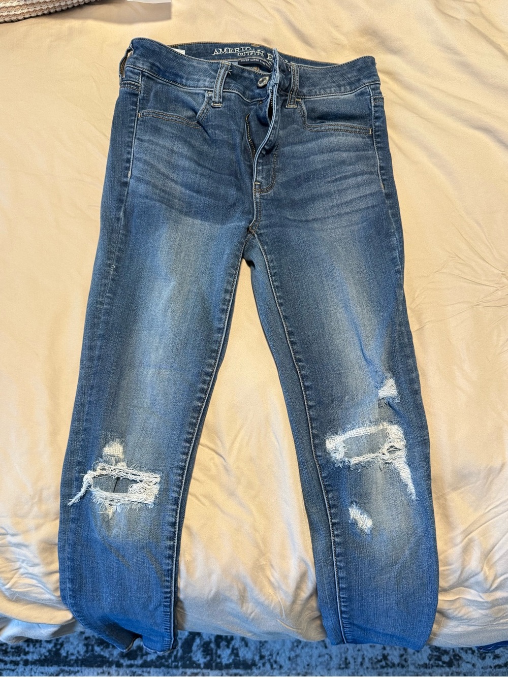 American Eagle Outfitters Medium Blue Distressed Skinny Jeans